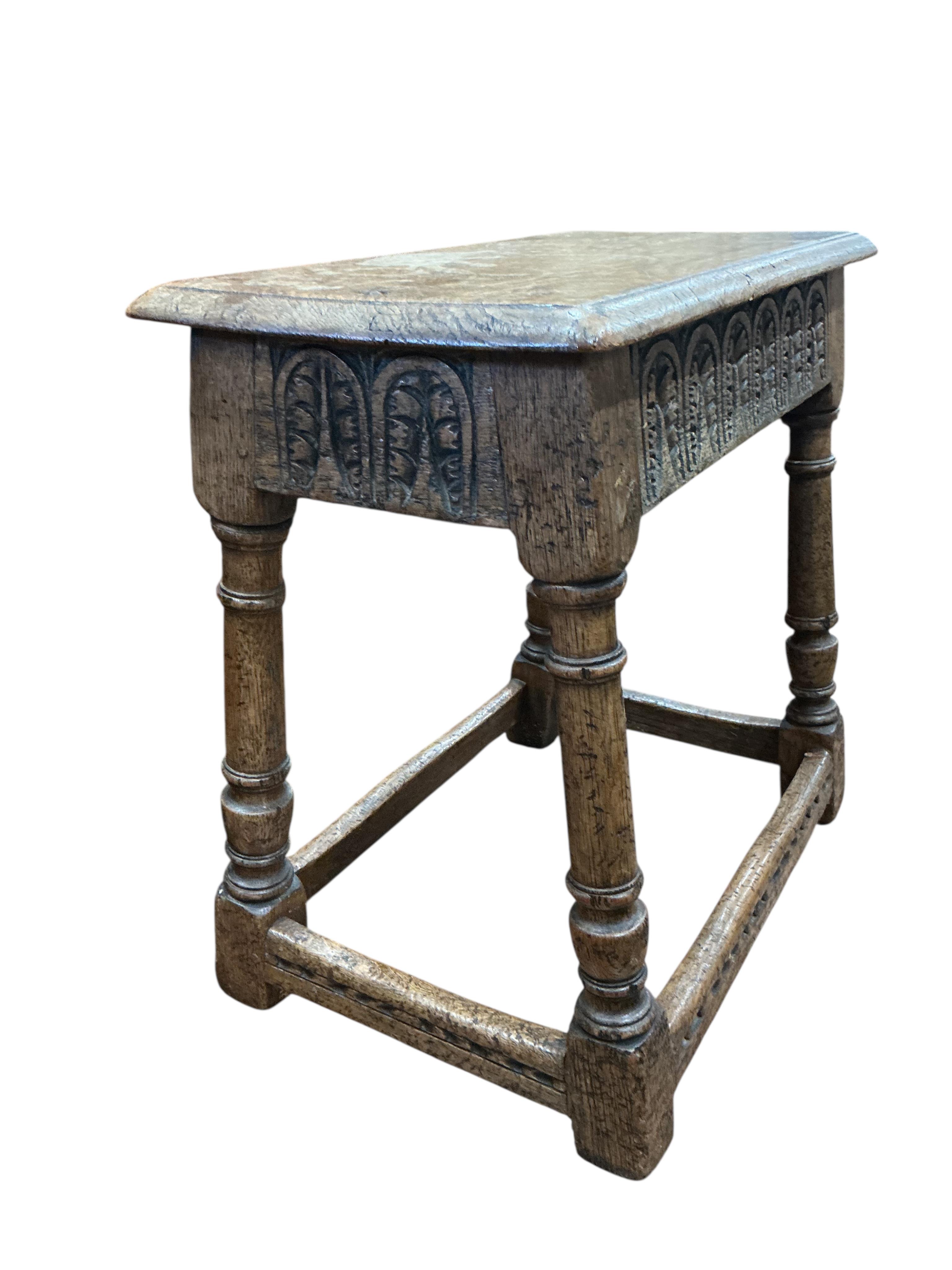 A 17th century style oak joint stool, width 49cm, depth 26cm, height 48cm